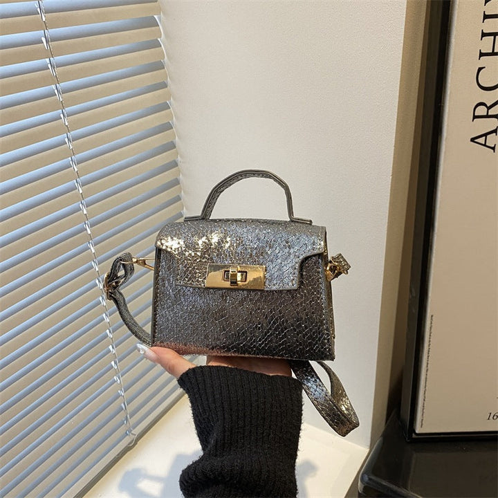 Women's mini handbag in stylish glamour style