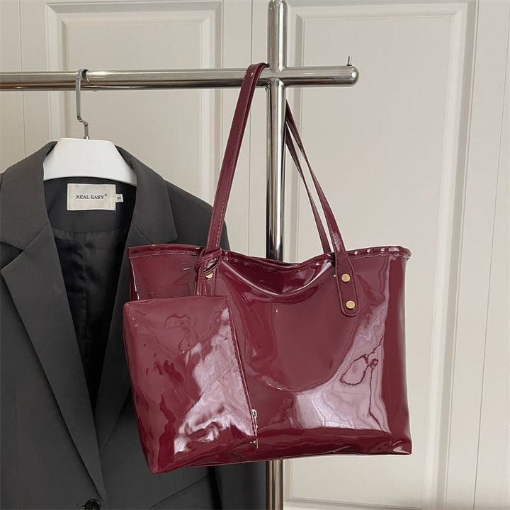 Women's elegant patent leather tote with removable interior compartment