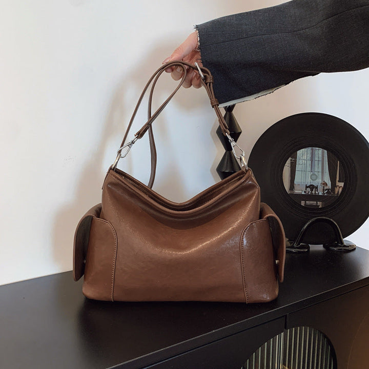 Women's shoulder bag made of high-quality synthetic leather with a stylish design