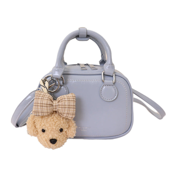 Women's mini handbag with detachable plush charm