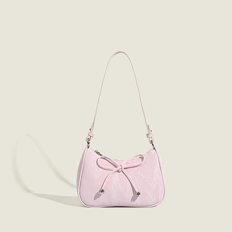 Ladies elegant mini handbag with playful drawstring