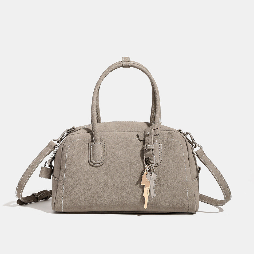 Women's handbag with removable and adjustable shoulder strap