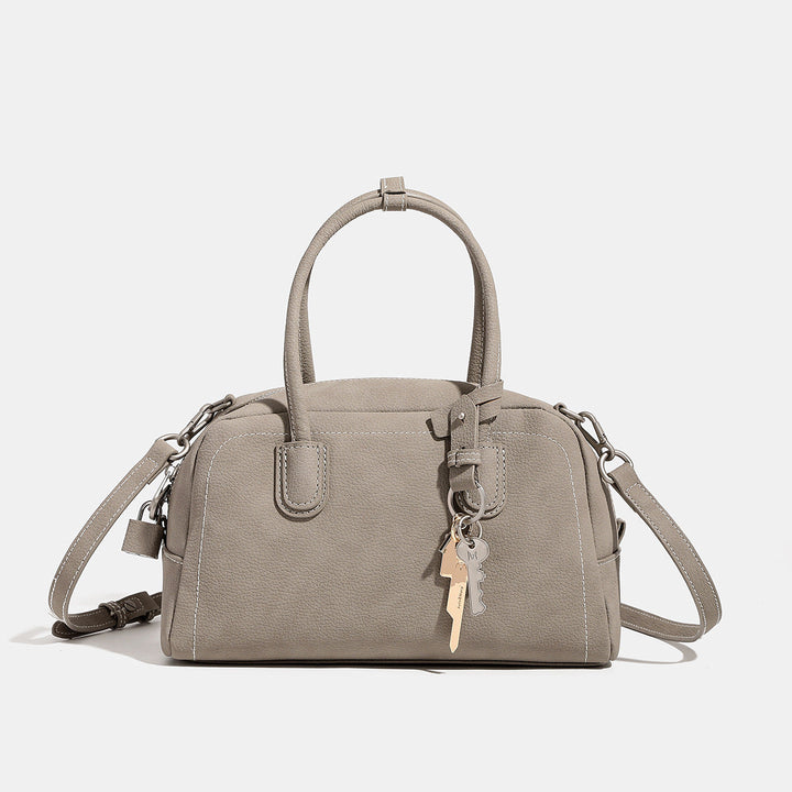 Women's handbag with removable and adjustable shoulder strap
