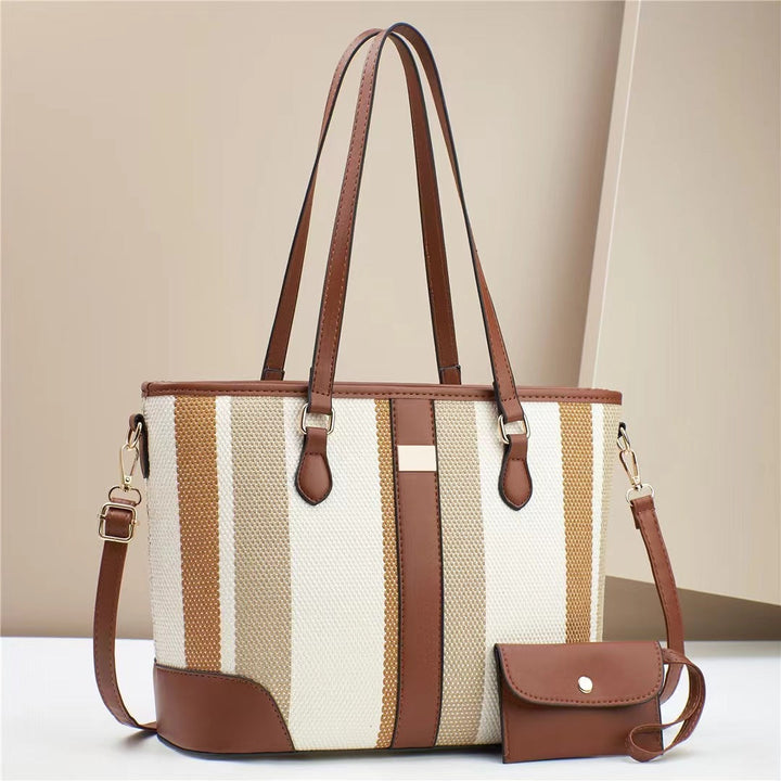 Women's tote bag with textured outer material and removable mini clutch