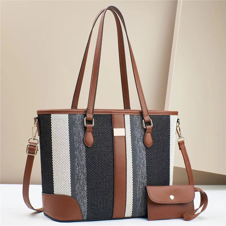 Women's tote bag with textured outer material and removable mini clutch