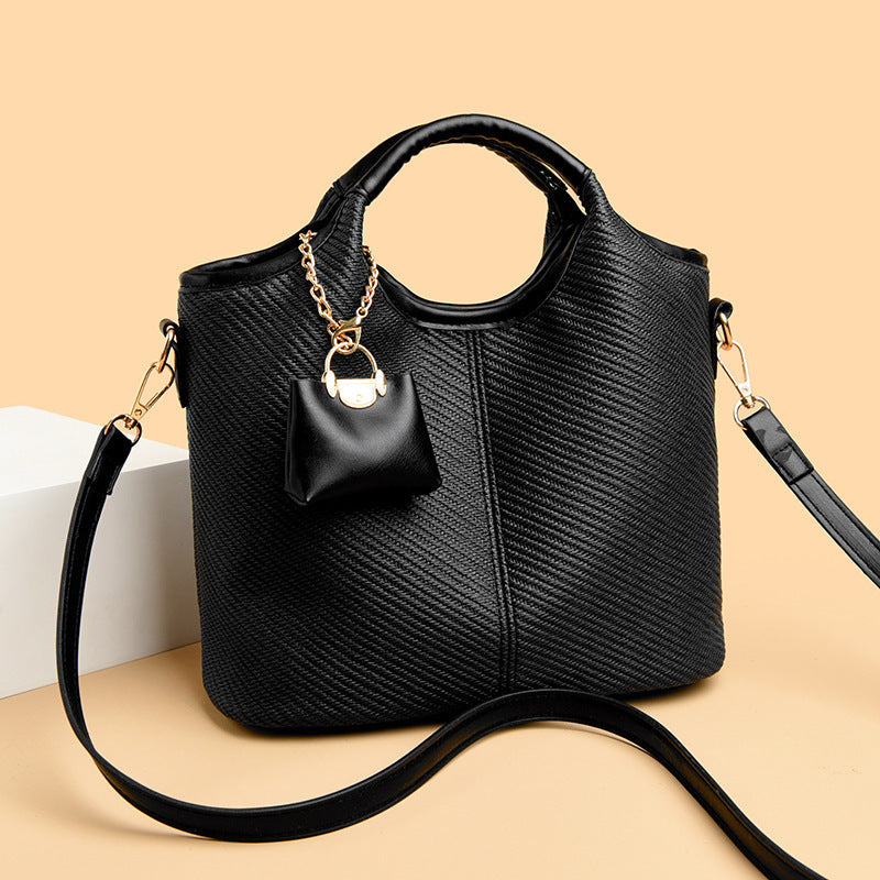 Ladies elegant handbag with textured design and removable mini organizer