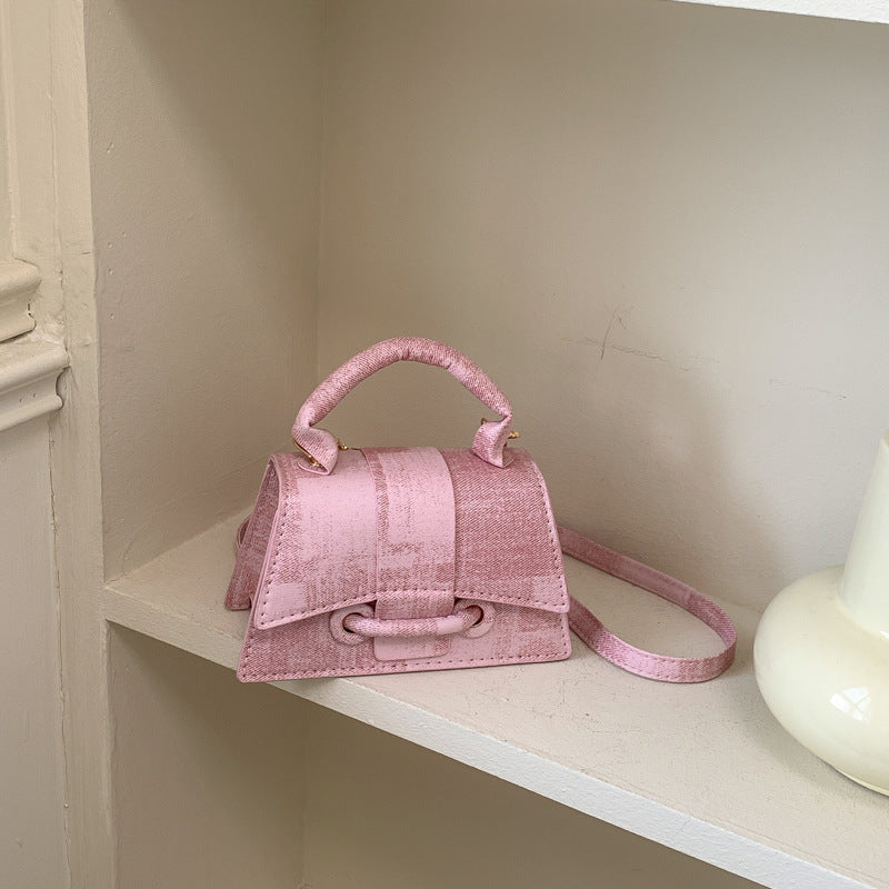 Women's elegant mini handbag with textured design