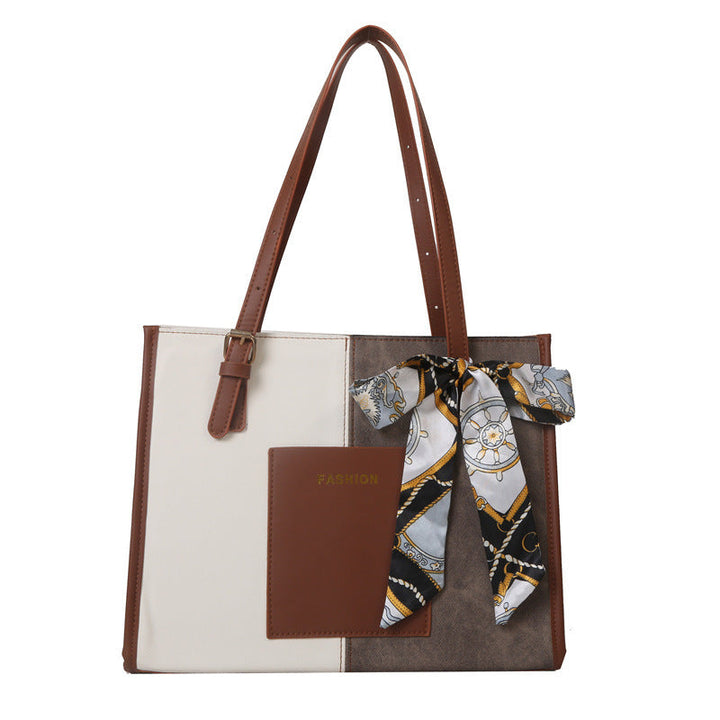 Women's tote bag with fashionable design and decorative silk ribbon