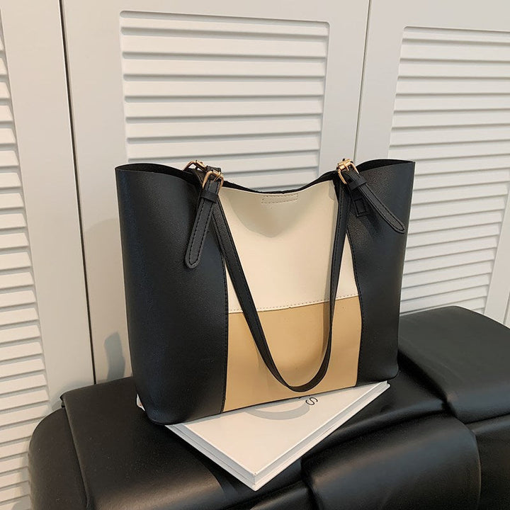 Women's spacious tote bag with elegant color block details