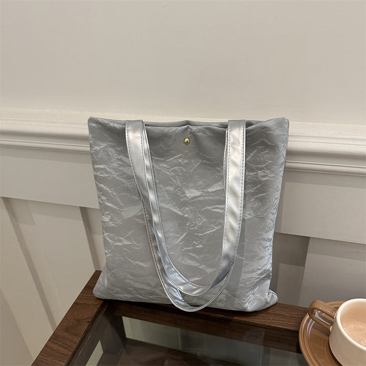 Women's tote bag made of high-quality synthetic leather with a textured surface