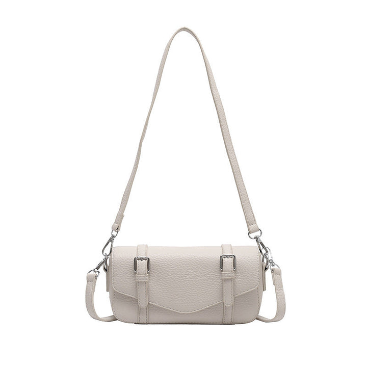 Women's elegant shoulder bag made of textured synthetic leather with adjustable shoulder strap