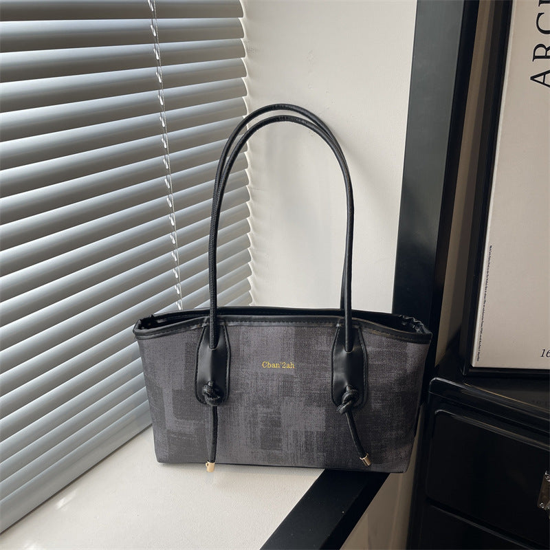 Ladies elegant tote bag with textured material