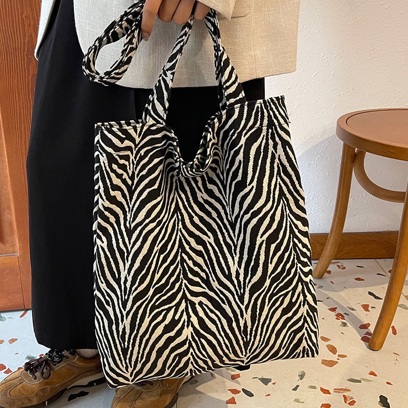 Women's jute bag with striking zebra pattern