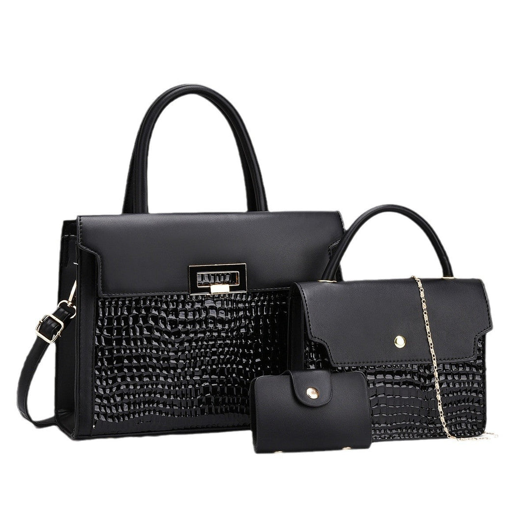 Ladies handbag set with luxurious crocodile leather look and removable clutch