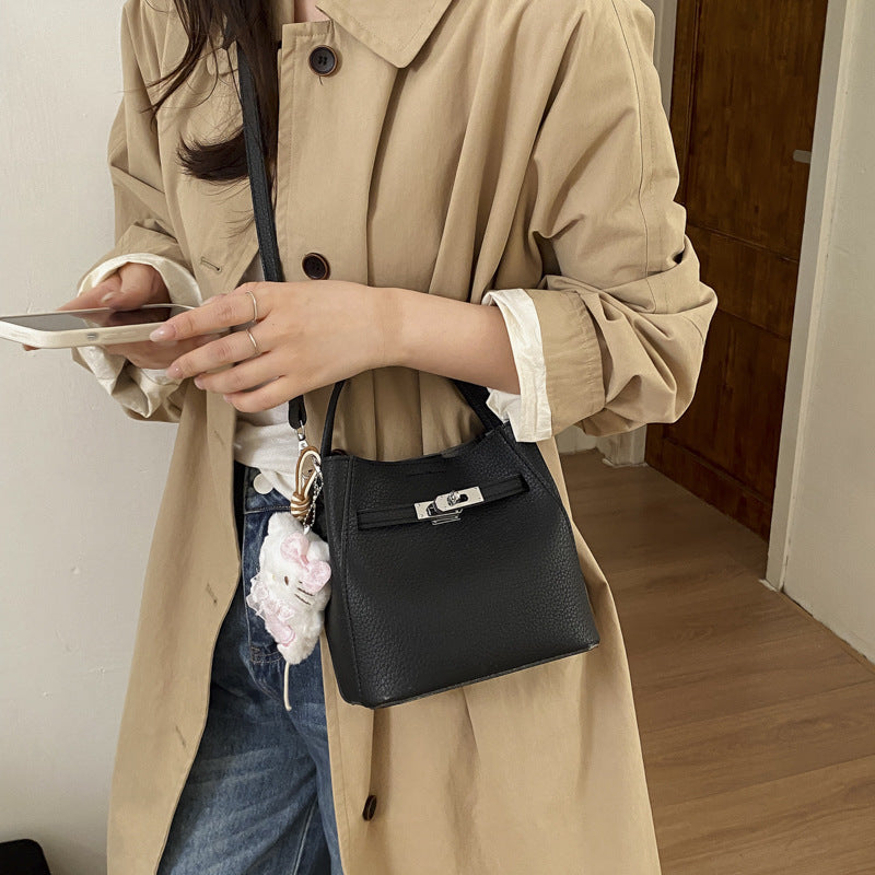 Women’s mini bag with detachable plush pendant