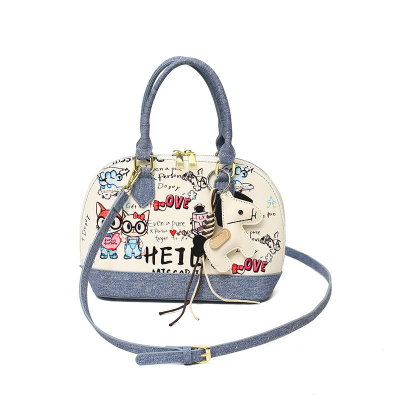 Women's mini handbag with animal charm and fashionable denim