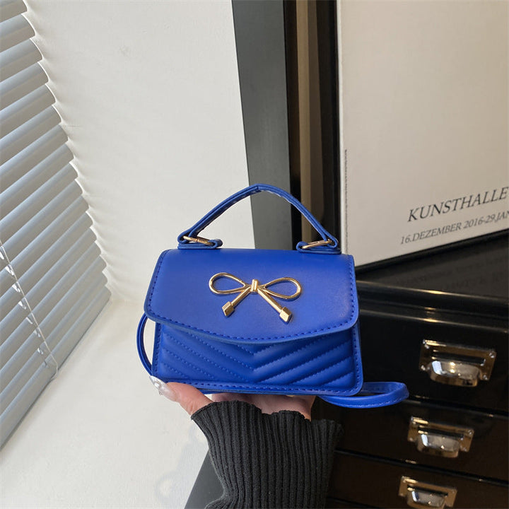 Women’s mini handbag with elegant bow decoration
