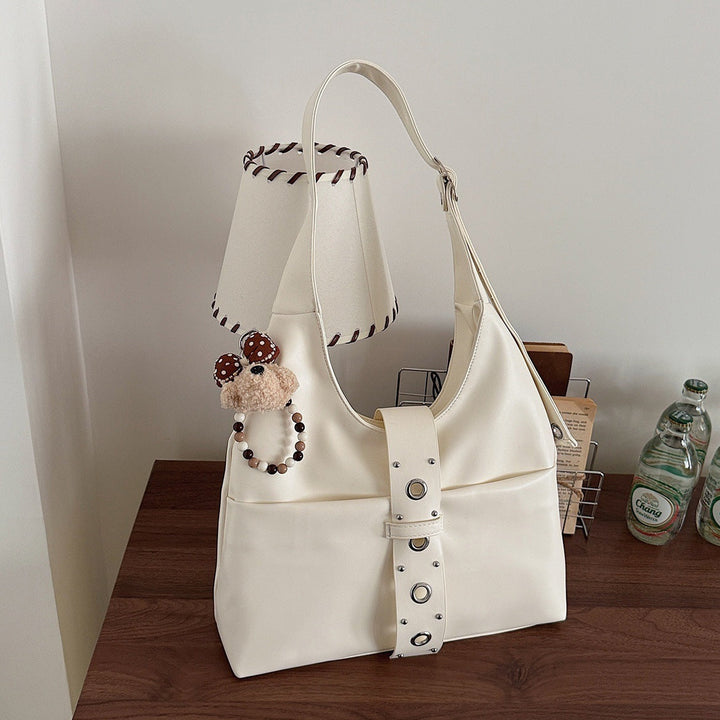 Ladies crossbody bag made of high-quality artificial leather with practical attachments