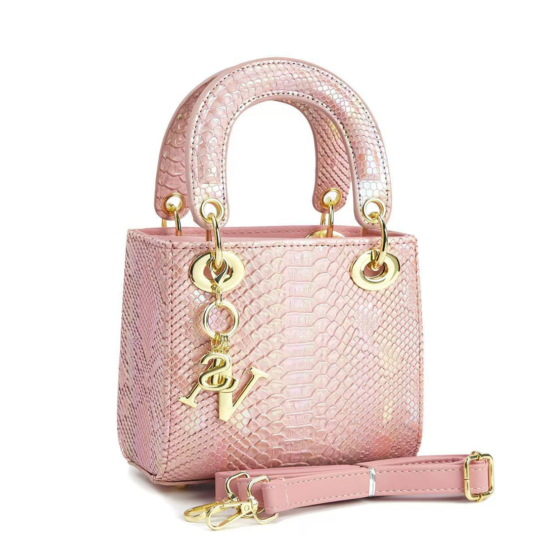 Ladies elegant mini handbag in modern snakeskin look with removable shoulder strap
