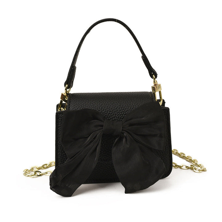 Ladies mini handbag with decorative bow design