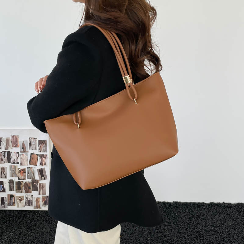 Ladies elegant tote bag with high-quality carrying handles and practical compartments