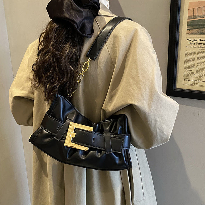 Women's crossbody bag with elegant chain accent and soft upper material