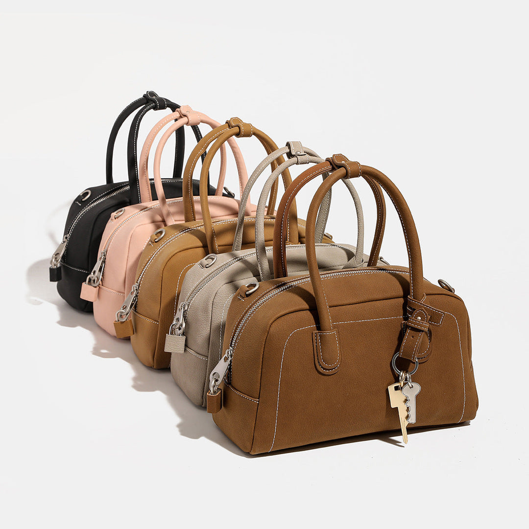 Women's handbag with removable and adjustable shoulder strap