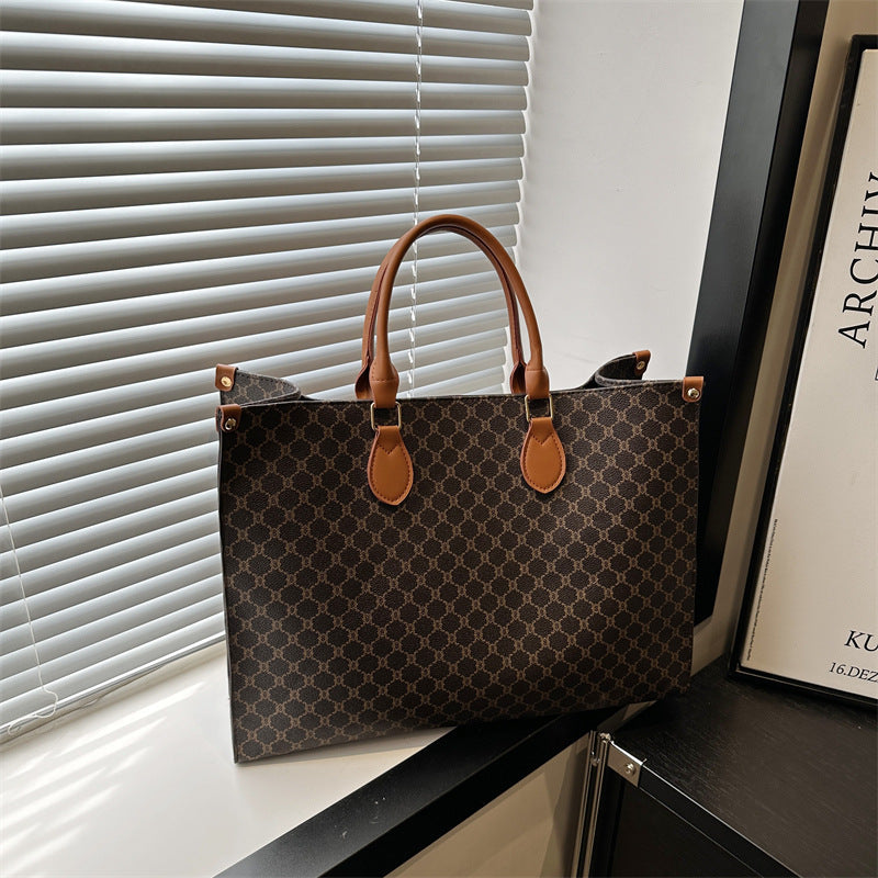 Women elegant tote bag with high-quality monogram design