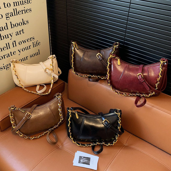 Women's shoulder bag with elegant chain accent