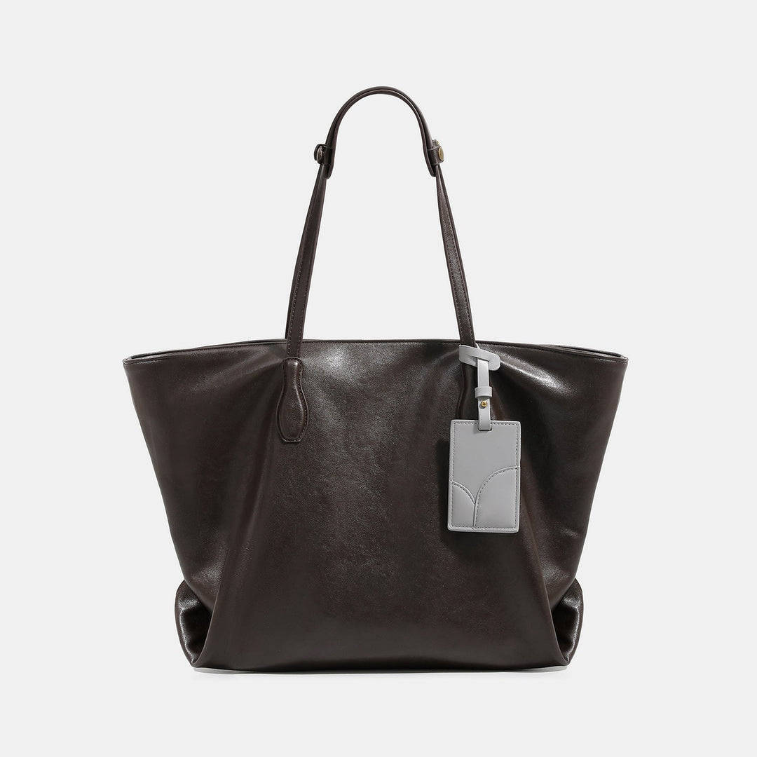 Women high-quality tote bag made of soft synthetic leather with textured design
