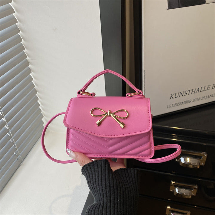 Women’s mini handbag with elegant bow decoration