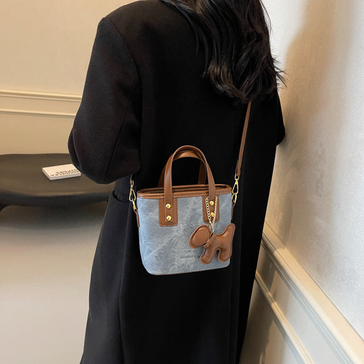 Women's mini bag made of high-quality material with removable funny charm