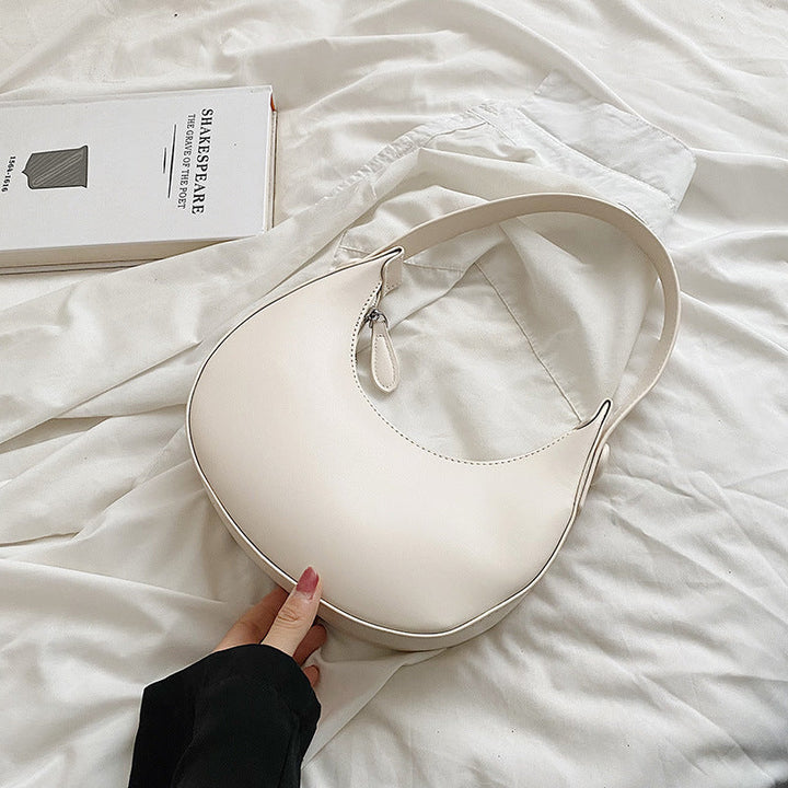 Women elegant shoulder bag with modern accents