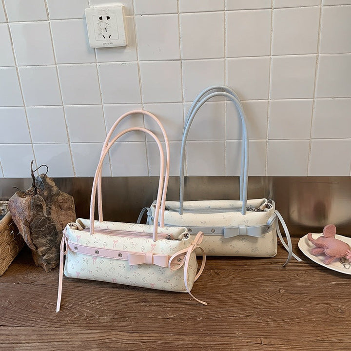 Women's crossbody bag with elegant fringe design