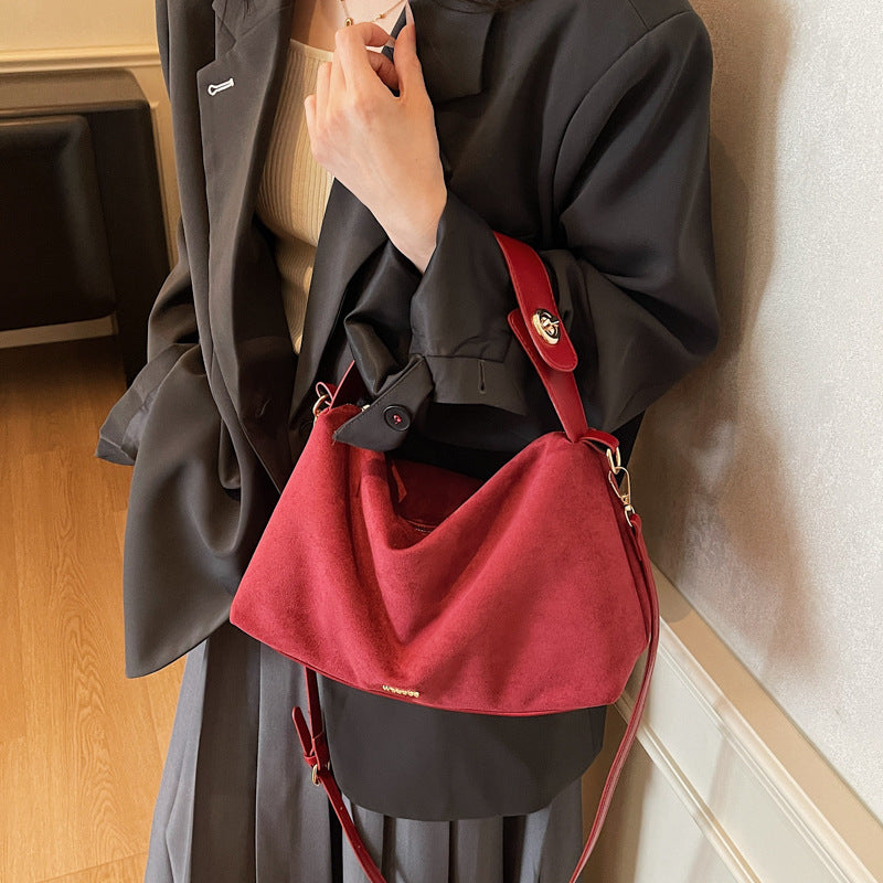 Women's practical shoulder bag made of soft suede