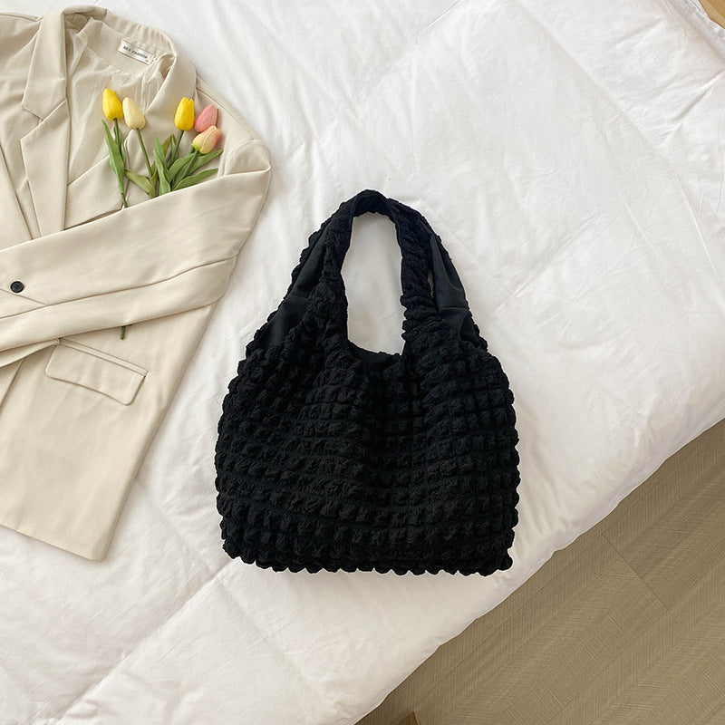 Women's tote bag with textured design