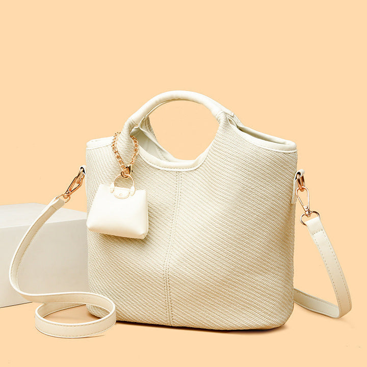 Ladies elegant handbag with textured design and removable mini organizer