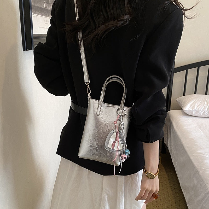 Ladies mini handbag with elegant pendant