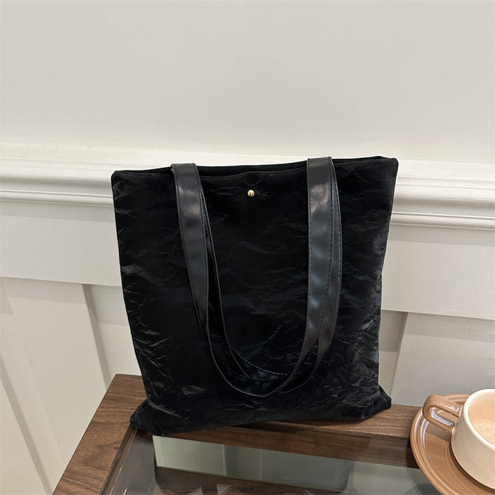 Women's tote bag made of high-quality synthetic leather with a textured surface