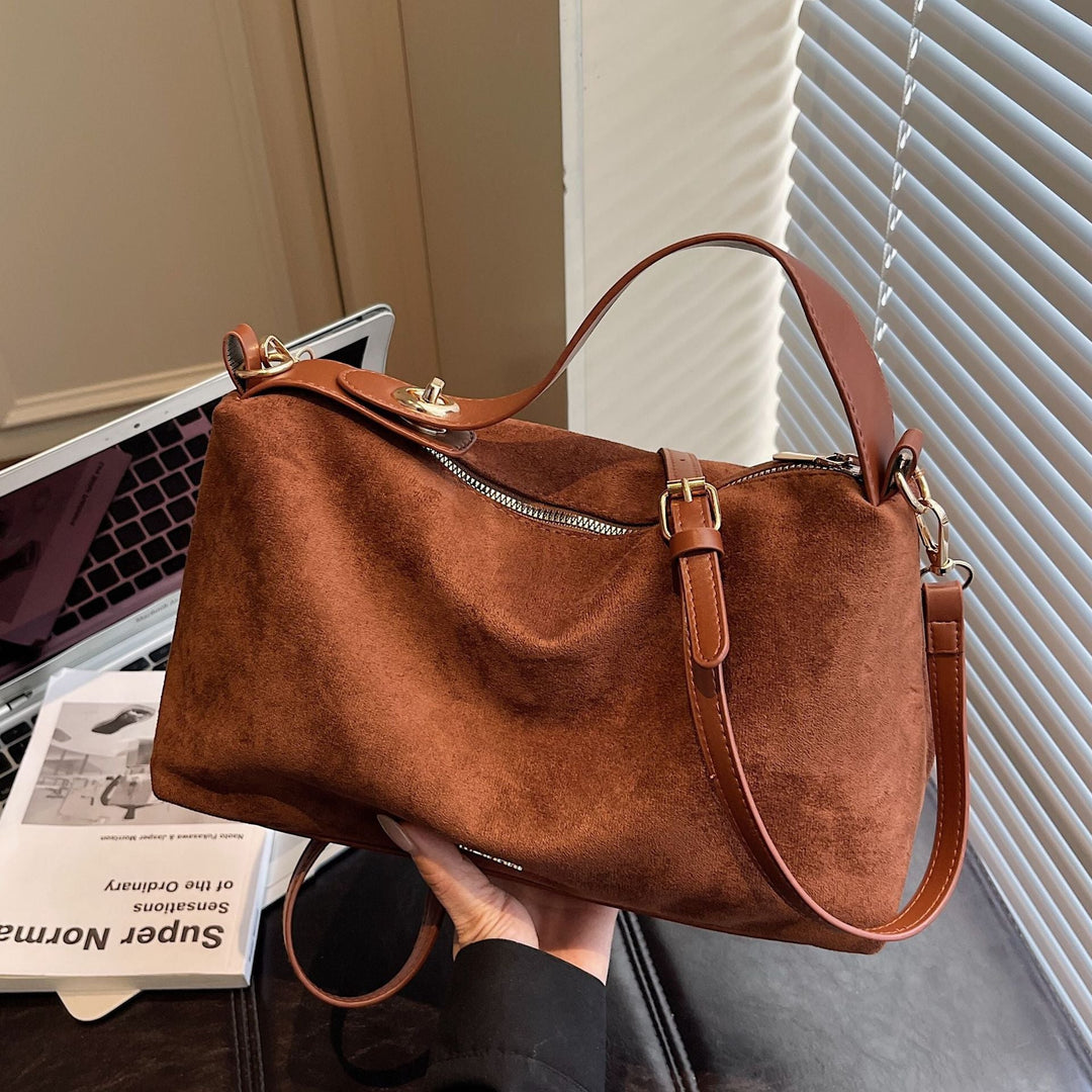Women's practical shoulder bag made of soft suede