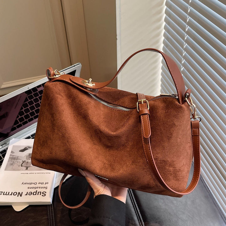 Women's practical shoulder bag made of soft suede