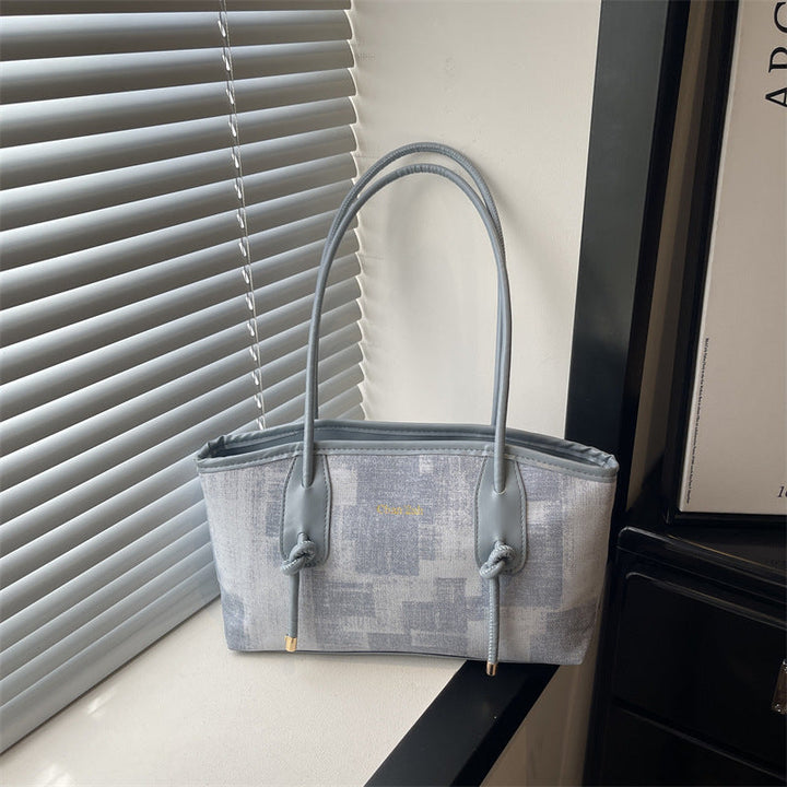 Ladies elegant tote bag with textured material