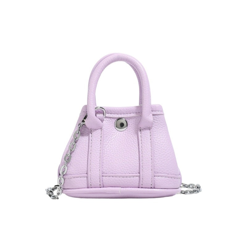 Ladies mini handbag with smooth structure and removable chain strap