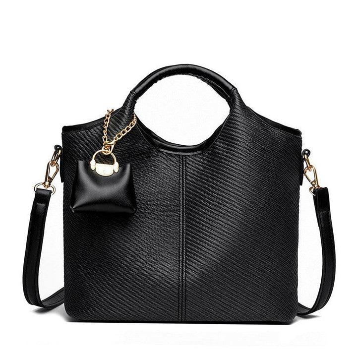 Ladies elegant handbag with textured design and removable mini organizer