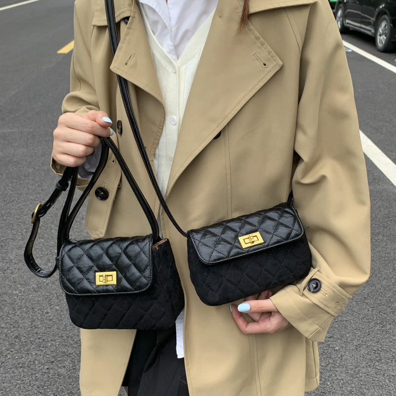Women elegant shoulder bag with matte finish and textured design