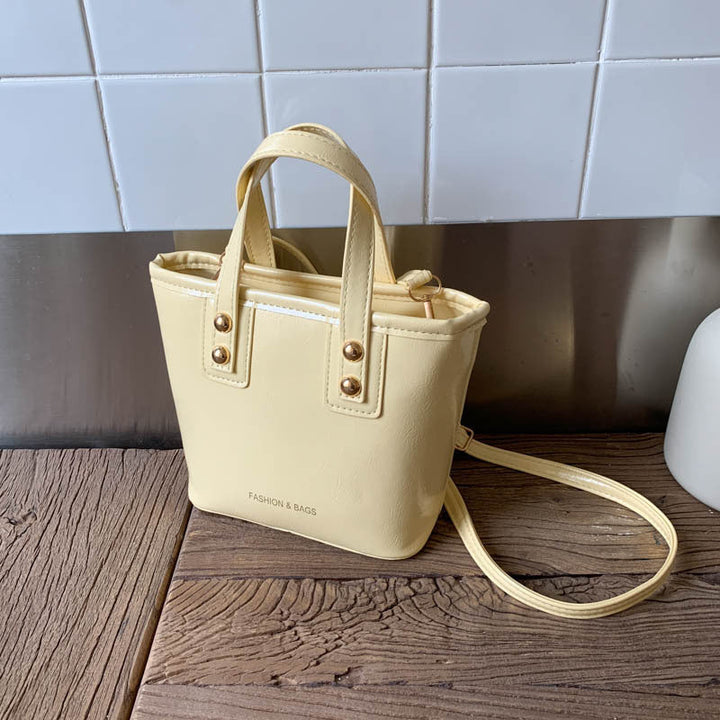 Ladies Mini-Handbag with elegant carry handle and practical inner compartment