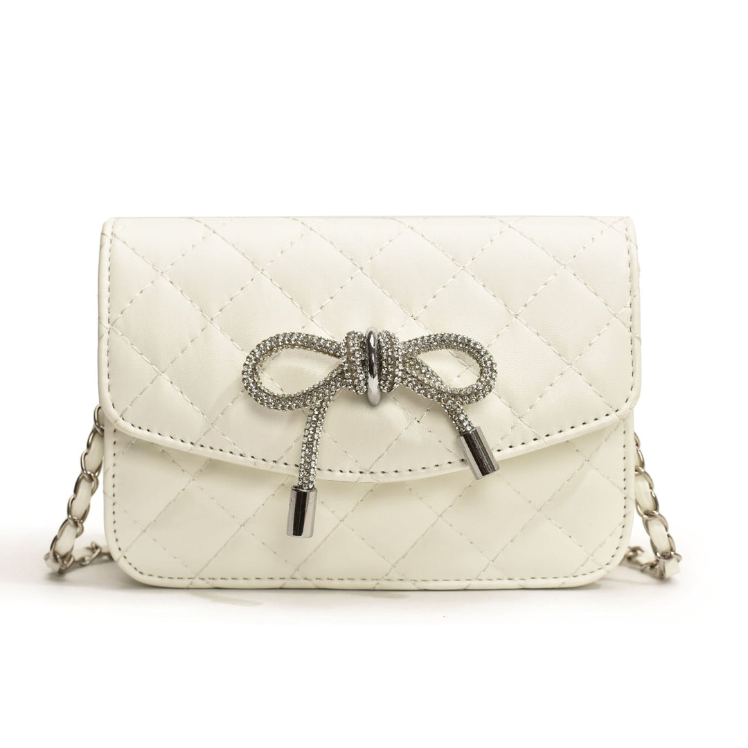 Ladies mini handbag with luxurious quilted pattern and sparkling chain pendant