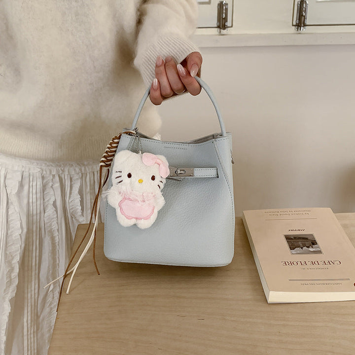 Women's mini handbag with cute charm