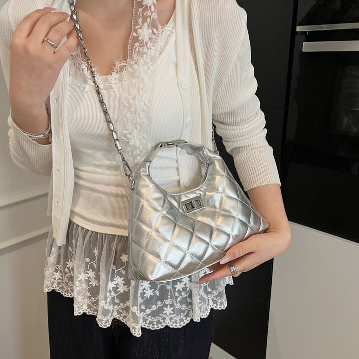 Women Mini-Bag with elegant quilted design and stylish chain closure