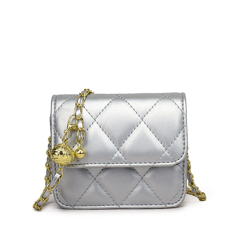 Ladies mini crossbody bag with shiny chain and charming pendant